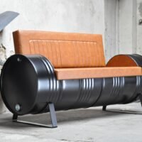 Canapé industriel en tonneau métal 200L upcyclé avec coussins